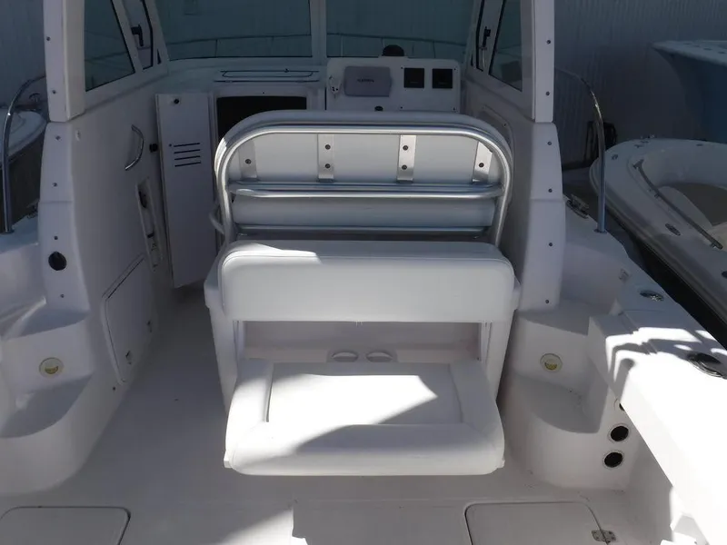 Slide: The Image of 2008 Pro-Line 26 XP boat interior with seating and control panel. - 20