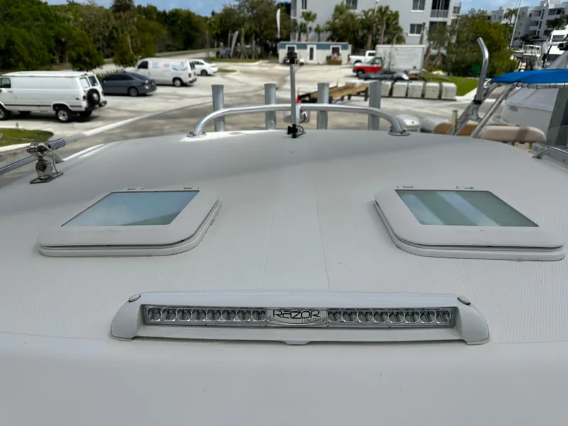 Slide: The Image of 2008 Pro-Line 26 XP boat deck with hatches and Razor light bar. - 35