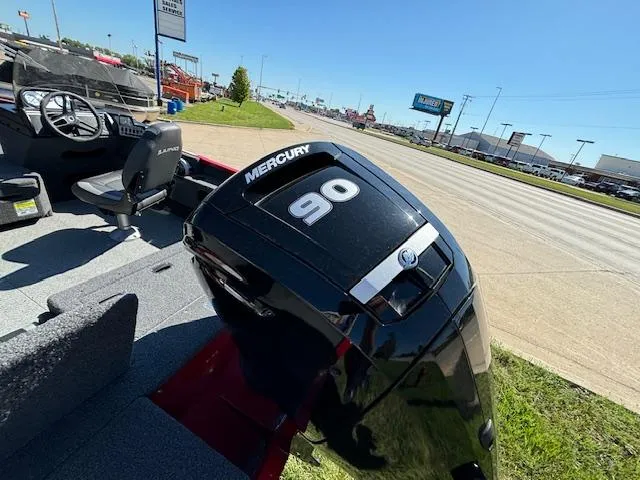 Slide: The Image of 2022 Lund 1675 Adventure SS with Mercury 90 engine, parked near a road. - 6