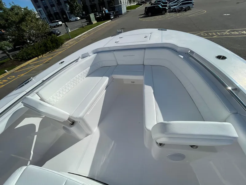 Slide: The Image of 2023 Southport 33 FE boat with spacious white seating area. - 4