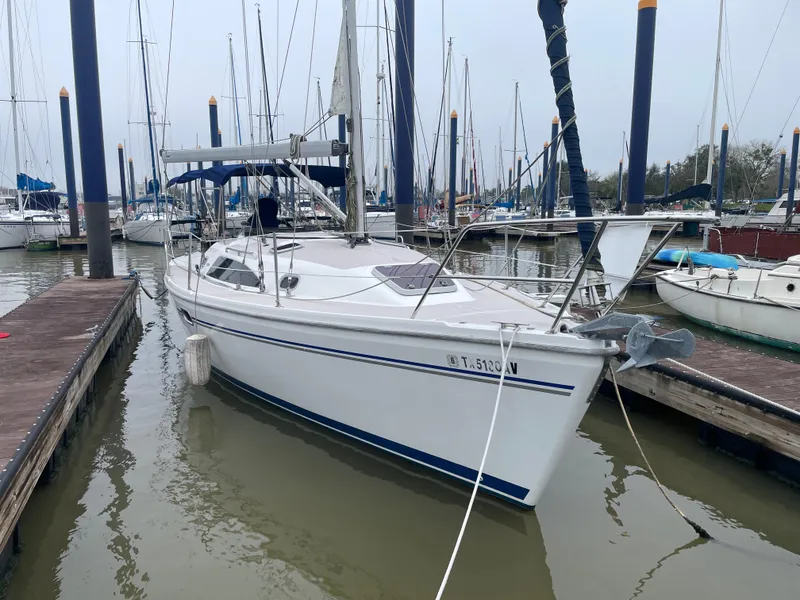 Slide: The Image of 2008 Catalina 309 sailboat docked in a marina. - 3