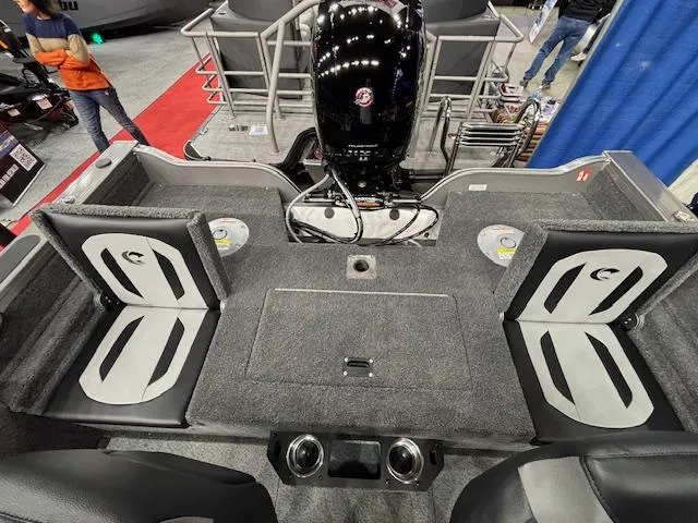 Slide: The Image of 2025 Crestliner 1850 Fish Hawk WT JS boat interior with seating and motor. - 20