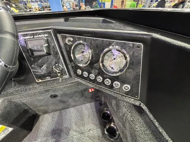 Slide: The Image of Dashboard of 2025 Crestliner 1850 Fish Hawk WT JS boat with gauges and controls. - 8