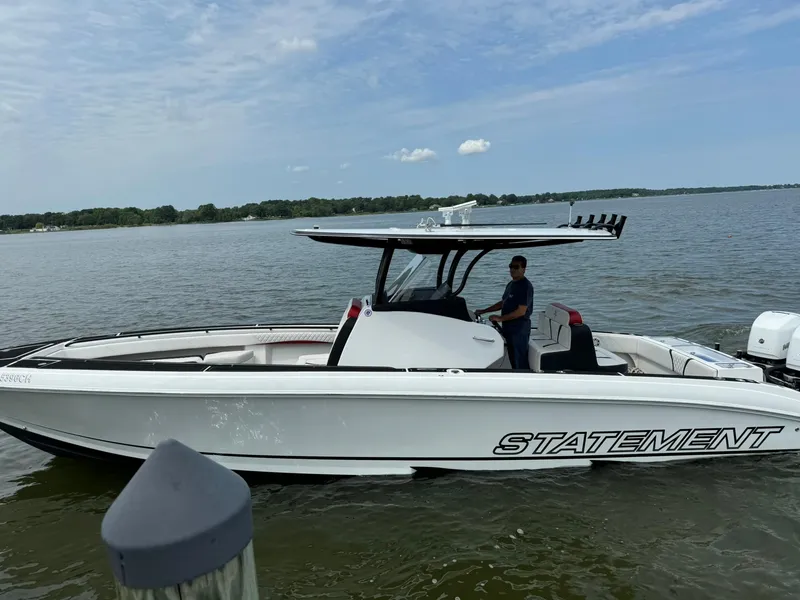 The Image of 2018 Statement 35 CC boat on water, featuring sleek design and spacious deck. - 0