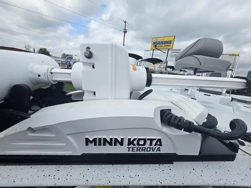 Slide: The Image of Minn Kota Terrova motor on 2025 Xpress H22B boat, cloudy sky background. - 15