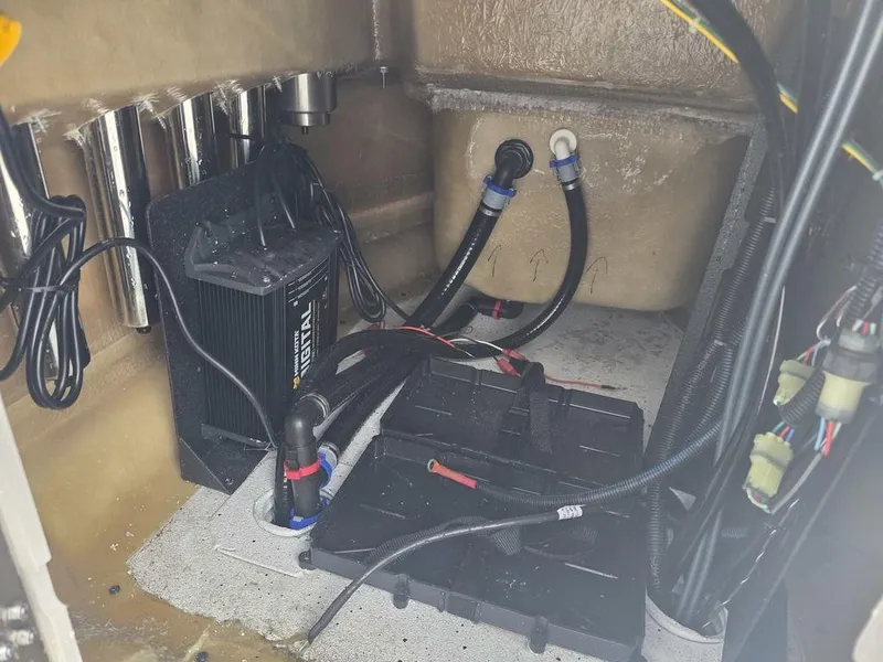 Slide: The Image of 2025 Xpress H22B boat interior wiring and battery setup. - 21