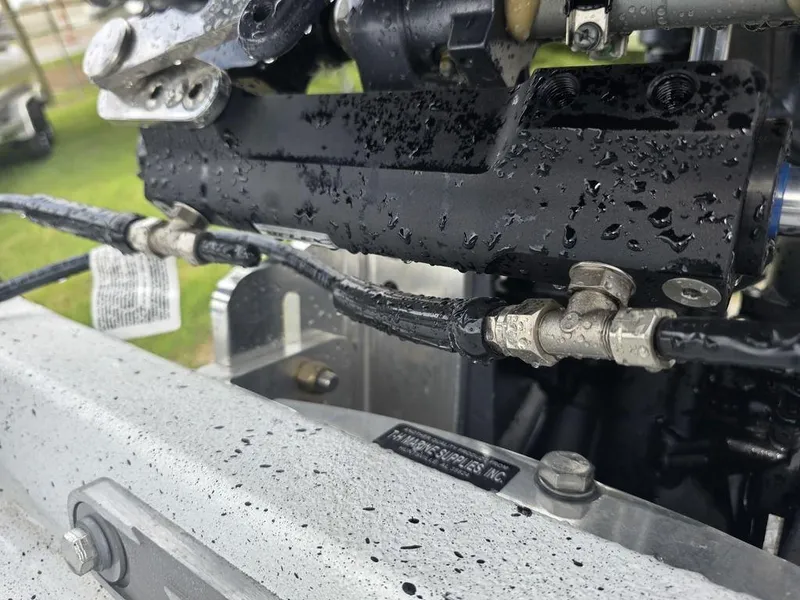 Slide: The Image of Close-up of Xpress H22B 2025 engine components with water droplets. - 27