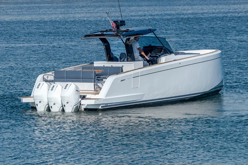 The Image of 2023 Pardo Yachts P38 cruising on water with triple outboard engines. - 0