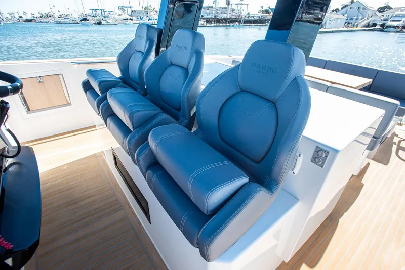 Slide: The Image of Luxurious seating on 2023 Pardo Yachts P38, featuring sleek blue upholstery. - 17