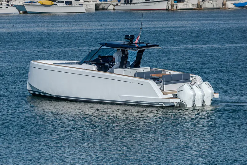 Slide: The Image of 2023 Pardo Yachts P38 cruising on a calm harbor. - 22