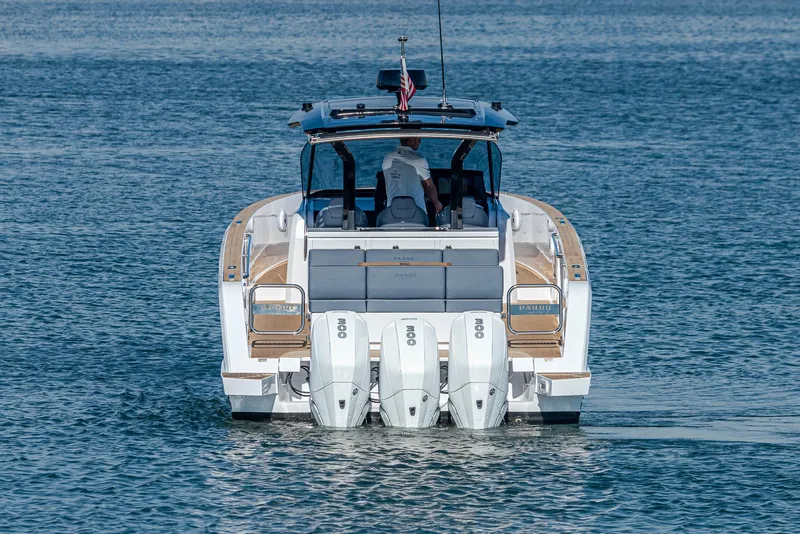 Slide: The Image of 2023 Pardo Yachts P38 with triple outboard engines on calm water. - 24