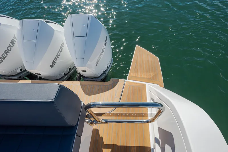 Slide: The Image of 2023 Pardo Yachts P38 with Mercury engines on water, featuring sleek deck design. - 6