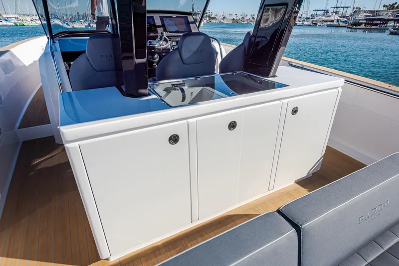 Slide: The Image of 2023 Pardo Yachts P38 interior with sleek cabinetry and modern design on open water. - 11