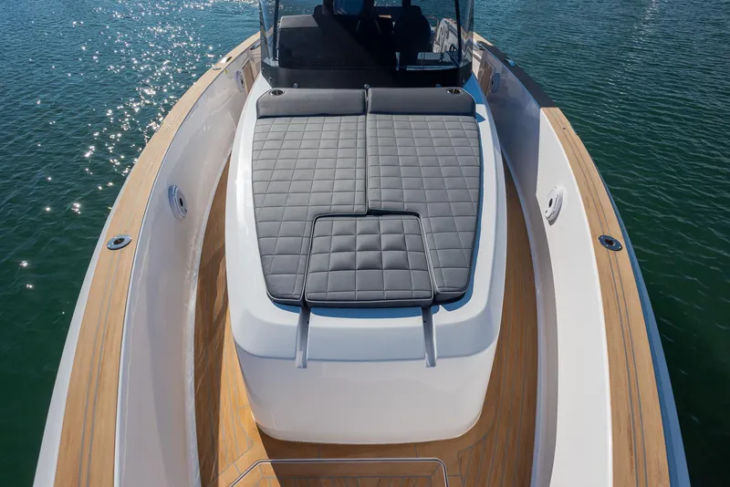 Slide: The Image of 2023 Pardo Yachts P38 with sleek deck design and luxurious sunbed. - 2