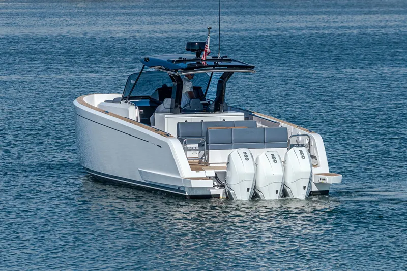Slide: The Image of 2023 Pardo Yachts P38 with triple outboard engines on calm water. - 23