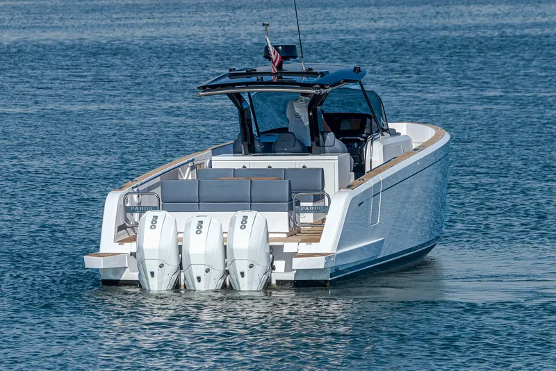 Slide: The Image of 2023 Pardo Yachts P38 with triple outboard engines on calm water. - 25