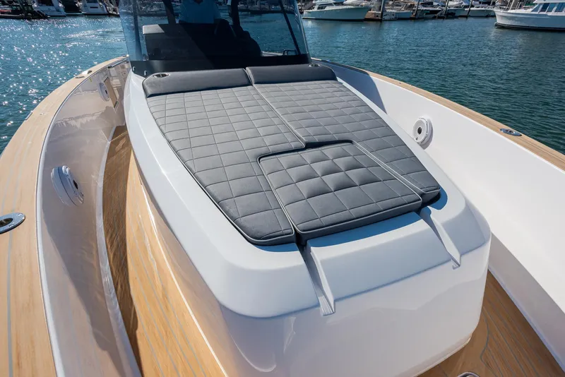 Slide: The Image of 2023 Pardo Yachts P38 with sleek deck design and cushioned seating. - 3
