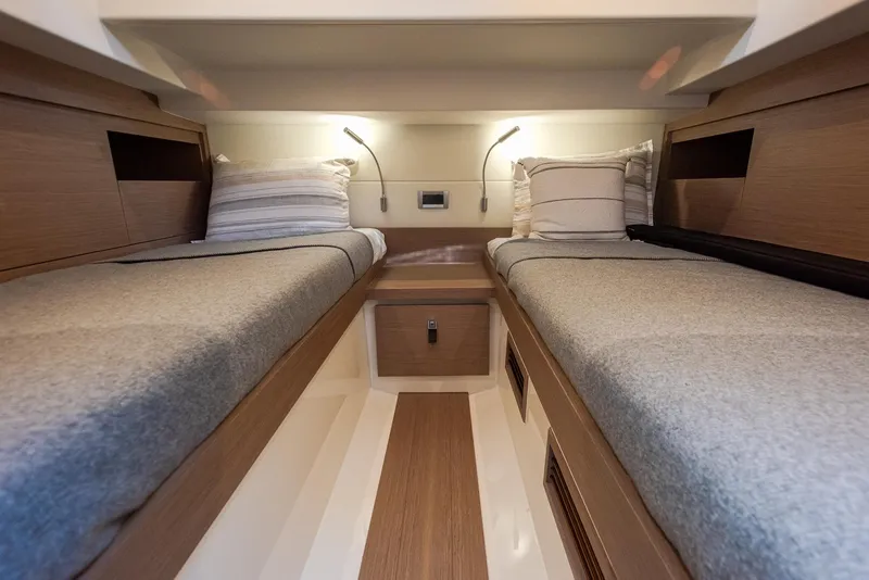 Slide: The Image of Interior cabin of 2023 Pardo Yachts P38 with twin beds and modern lighting. - 34