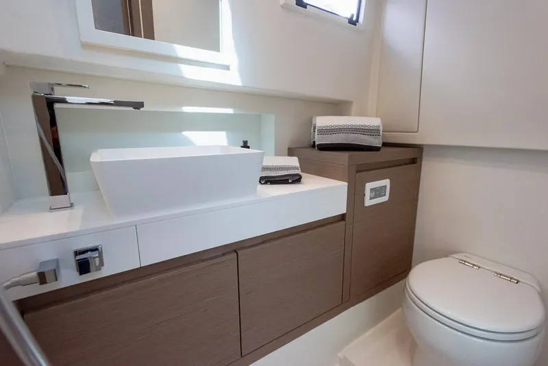 Slide: The Image of Modern bathroom interior of 2023 Pardo Yachts P38, featuring sleek sink and toilet design. - 35