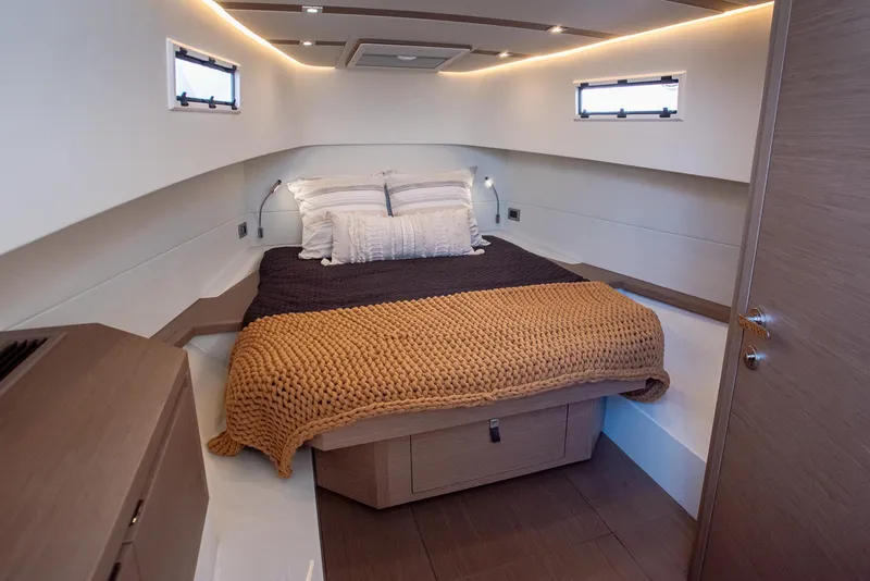 Slide: The Image of Luxurious cabin interior of 2023 Pardo Yachts P38 with cozy bedding. - 36