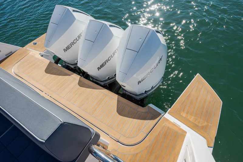 Slide: The Image of 2023 Pardo Yachts P38 with triple Mercury engines on teak deck. - 7