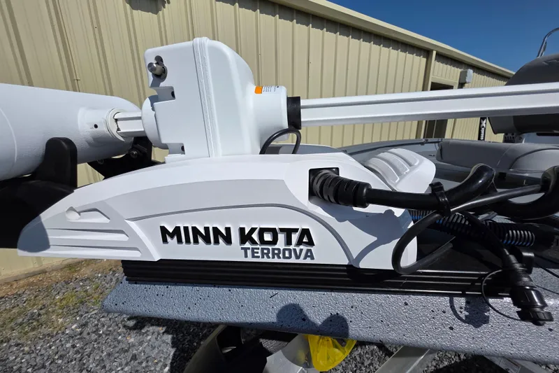 Slide: The Image of Minn Kota Terrova motor on 2025 Xpress H20B Bay boat, outdoor setting. - 13
