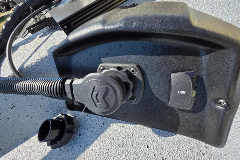 Slide: The Image of 2025 Xpress H20B Bay boat trim control panel with wiring and connectors. - 14