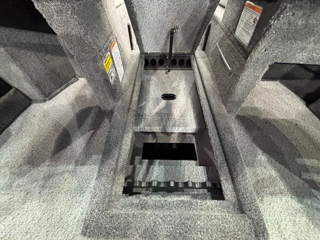 Slide: The Image of 2025 Crestliner 1850 Super Hawk WT JS interior storage compartment. - 10