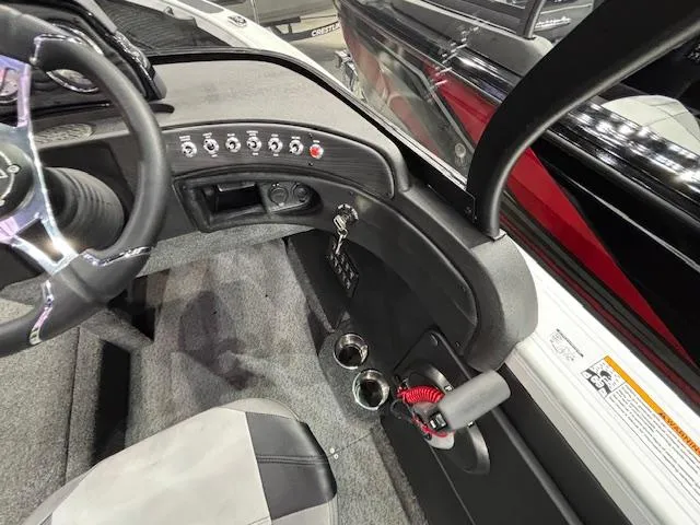 Slide: The Image of Interior view of 2025 Crestliner 1750 Super Hawk WT JS boat dashboard. - 16