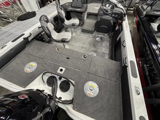 Slide: The Image of 2025 Crestliner 1750 Super Hawk WT JS interior with seating and control panel. - 3