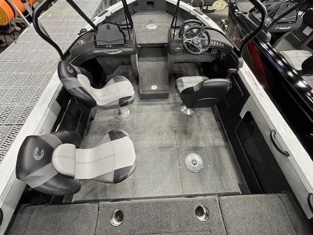 Slide: The Image of 2025 Crestliner 1750 Super Hawk WT JS boat interior with seating and steering console. - 4