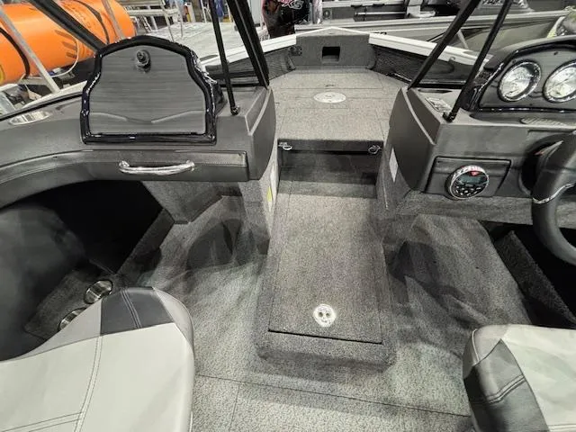 Slide: The Image of Interior of 2025 Crestliner 1750 Super Hawk WT JS boat, featuring seating and dashboard. - 8