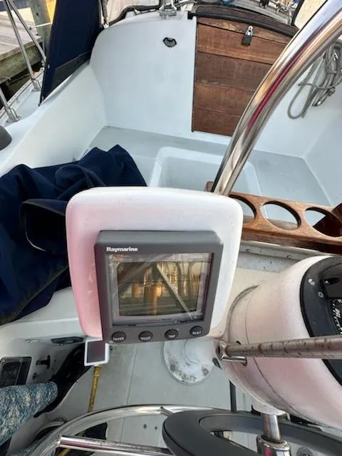 Slide: The Image of Cockpit of 1985 Ericson 30 Plus sailboat with navigation equipment. - 37