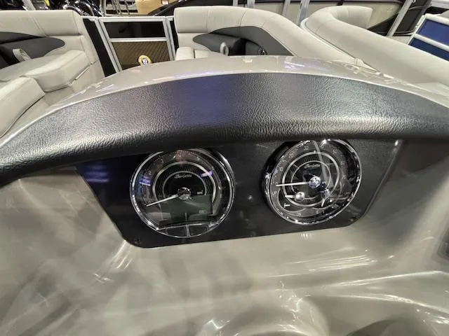 Slide: The Image of Dashboard of 2025 Barletta ARIA 22UC boat with dual gauges and sleek design. - 21