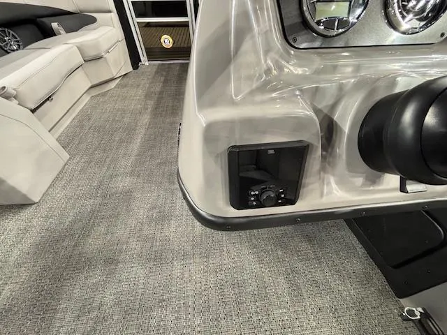 Slide: The Image of 2025 Barletta ARIA 22UC interior dashboard with control panel and seating. - 22