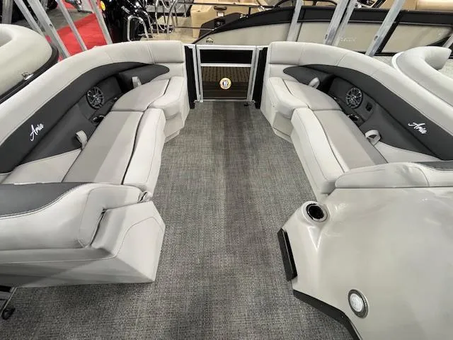Slide: The Image of 2025 Barletta ARIA 22UC pontoon boat interior with gray seating and carpeted floor. - 25