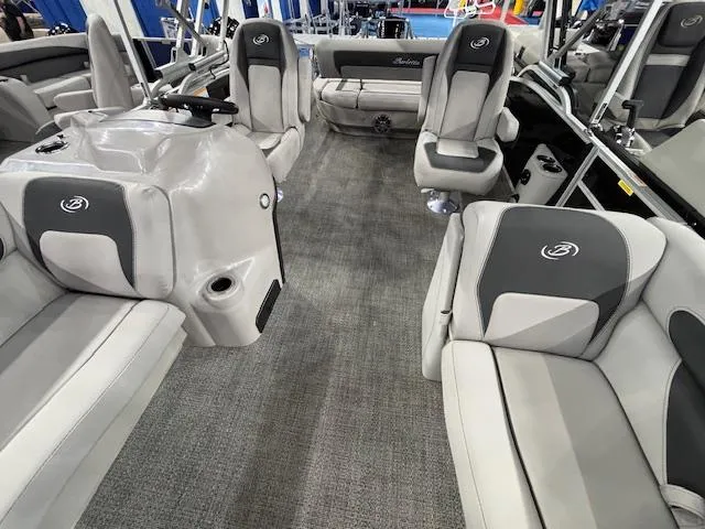 Slide: The Image of 2025 Barletta ARIA 22UC pontoon boat interior with gray seating and modern design. - 5