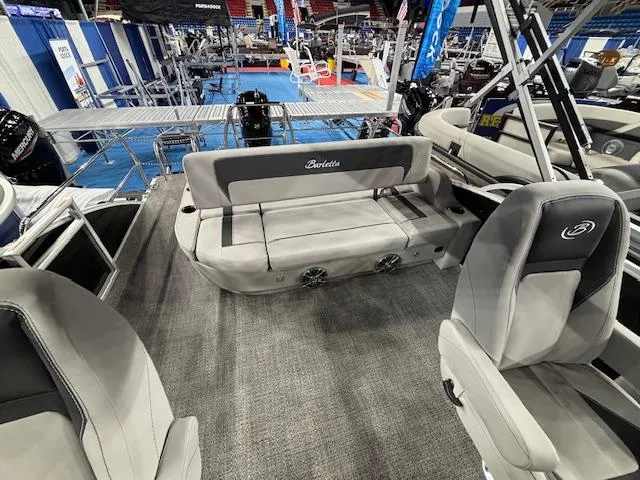 Slide: The Image of 2025 Barletta ARIA 22UC pontoon boat interior with gray seating and modern design. - 8