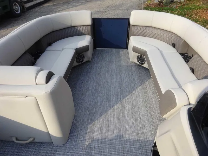 Slide: The Image of 2024 Harris Sunliner 230 interior with spacious seating and modern design. - 11