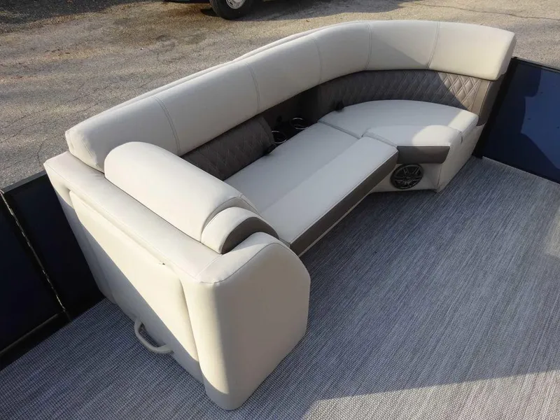 Slide: The Image of 2024 Harris Sunliner 230 boat seating with plush upholstery and modern design. - 9