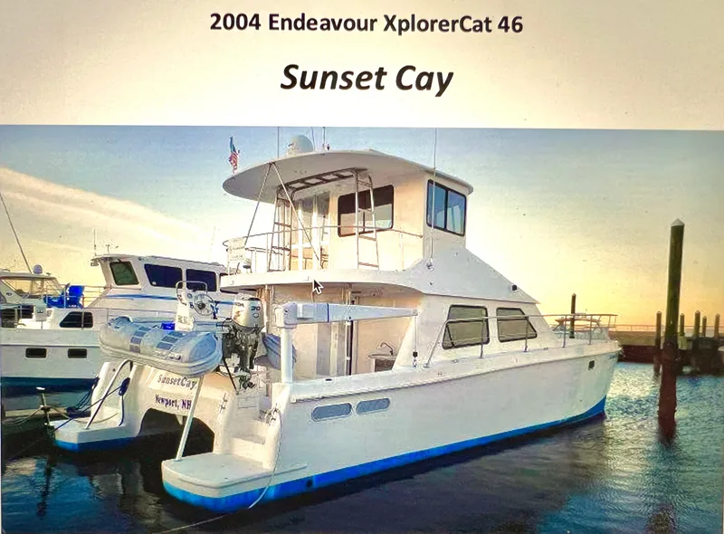 The Image of 2004 Endeavour Explorer 46 PowerCat "Sunset Cay" docked at sunset. - 0