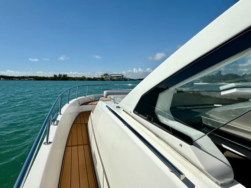 Slide: The Image of Azimut 40 Verve 2019 yacht cruising on clear blue waters under a sunny sky. - 20