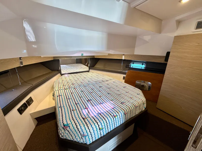 Slide: The Image of 2019 Azimut 40 Verve cabin interior with modern design and comfortable bedding. - 7
