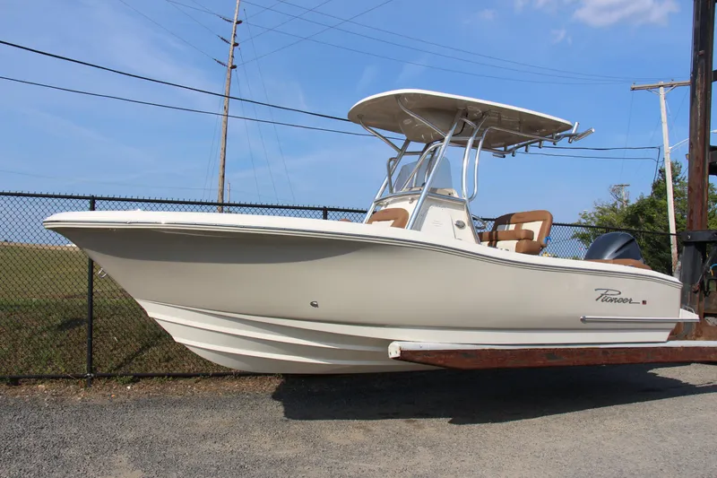 Slide: The Image of 2025 Pioneer 222 Islander boat on display, featuring sleek design and modern amenities. - 7
