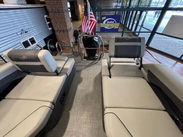 Slide: The Image of 2025 Barletta Cabrio 22M interior with plush seating, displayed indoors. - 10