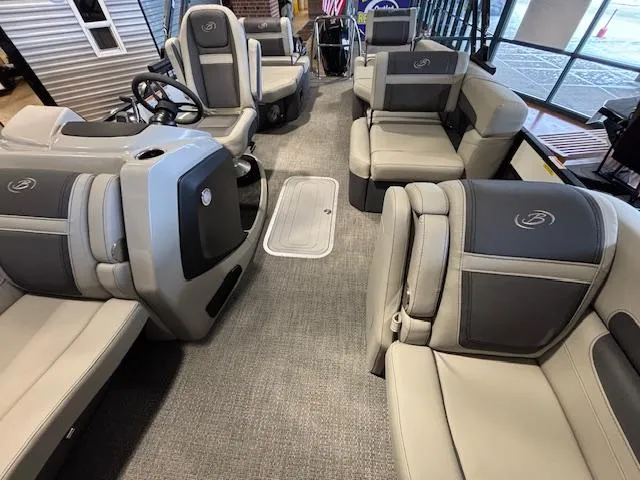 Slide: The Image of 2025 Barletta Cabrio 22M pontoon boat interior with luxurious seating and modern design. - 4
