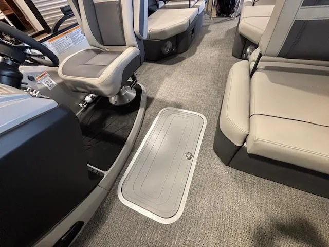 Slide: The Image of Interior of 2025 Barletta Cabrio 22M pontoon boat with seating and storage. - 6