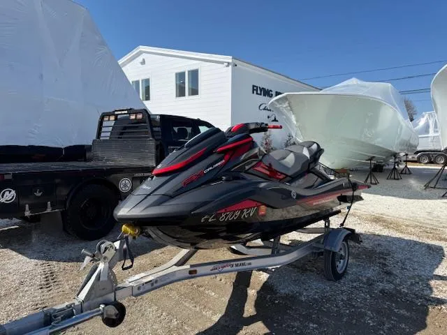 Slide: The Image of 2019 Yamaha WaveRunner SVHO on trailer, parked outdoors near boats and a building. - 18