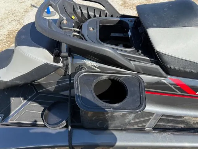 Slide: The Image of 2019 Yamaha WaveRunner SVHO with open storage compartment, black and red design. - 2