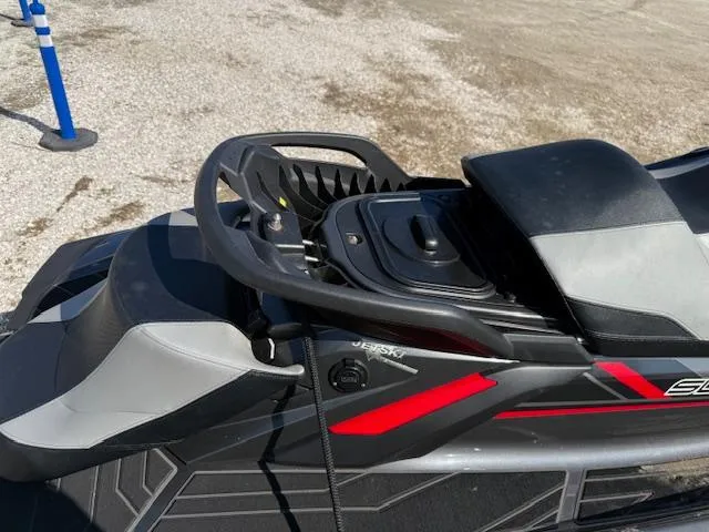 Slide: The Image of 2019 Yamaha WaveRunner SVHO jet ski, black and red design, parked on gravel. - 3